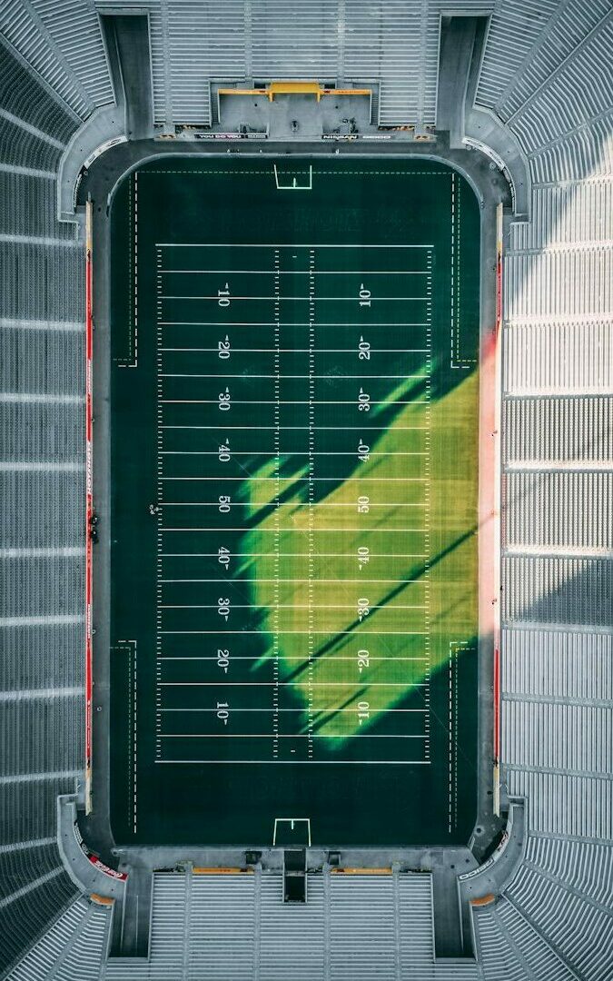 aerial photo of football field during daytime